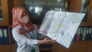 Alih Media DPK Kaltim Revitalisasi Koleksi Buku Sejarah Kuno